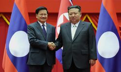 Kim Jong-un ve Thongloun Sisoulith bir araya geldi
